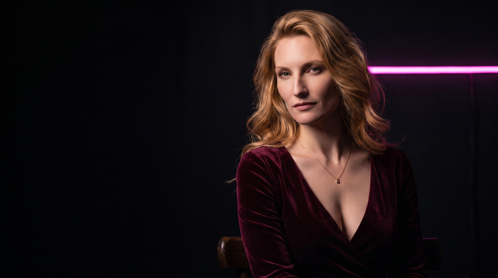 What is charisma — a woman who seems to radiate her own light, presence a room organizes around